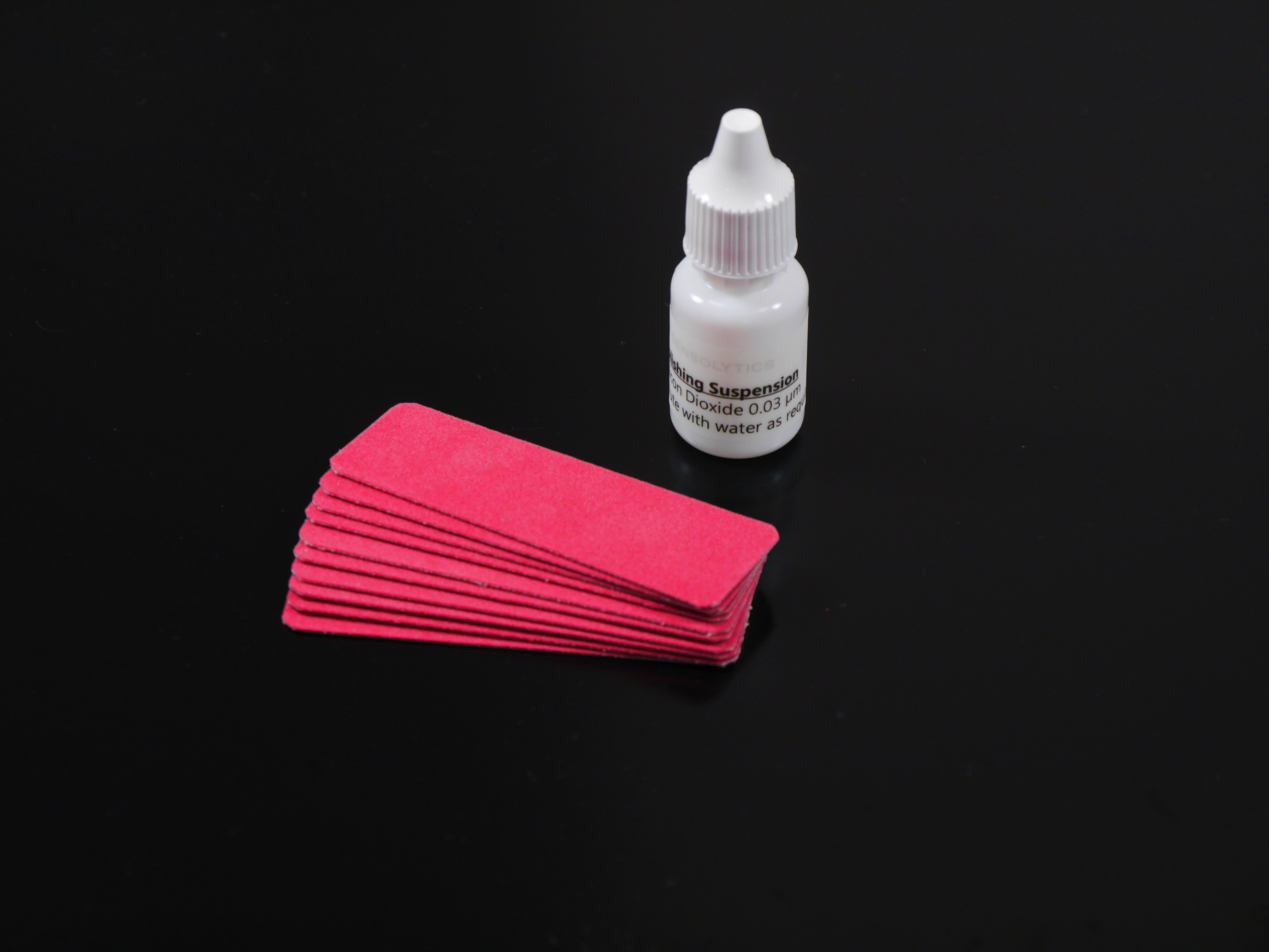Polishing suspension and cloth